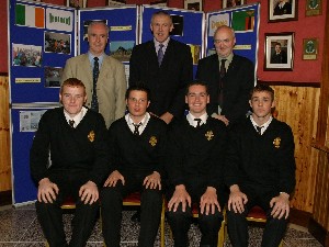 Guest Speaker Dr. Eugene Young, Director of High Performance Planning-Gealic Football, congratulates the Abbey Grammar's County Minor stars in Football and Hurling from last year. Included are Armagh County Minor Footballer Kevin Dyas, Down County Minor Footballers Michael McAllister and Kevin McKernan, and Down County Minor Hurler Eoin McGuinness. Also Included is  Mr. Dermot McGovern, Headmaster and Mr. Sean Og McAteer, Board of Governors.